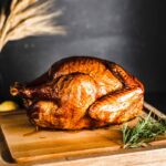 smoked turkey on cutting board horizontal