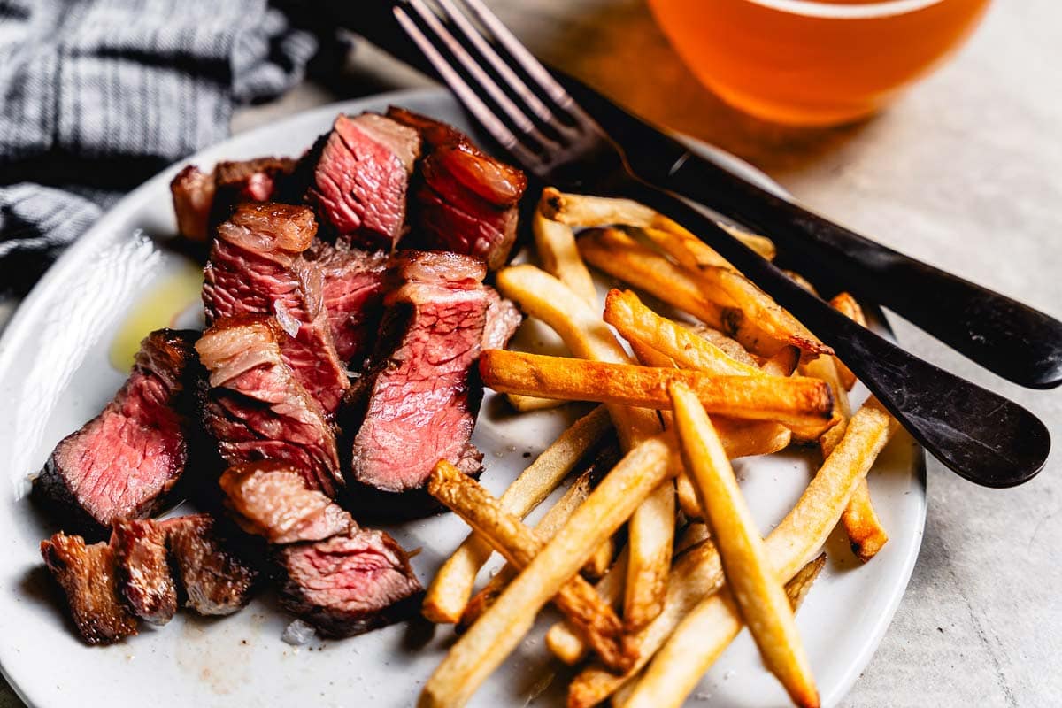 sous vide picanha with fries close up horizontal
