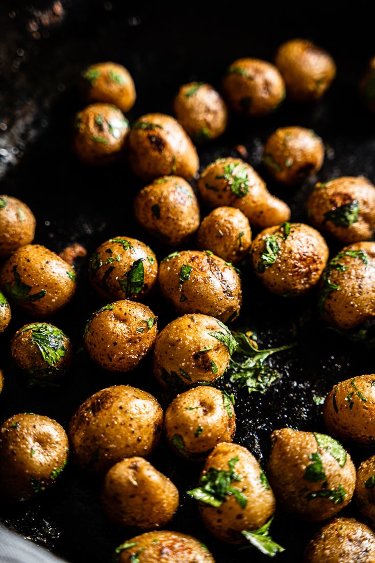 sous vide potatoes in pan close up vertical