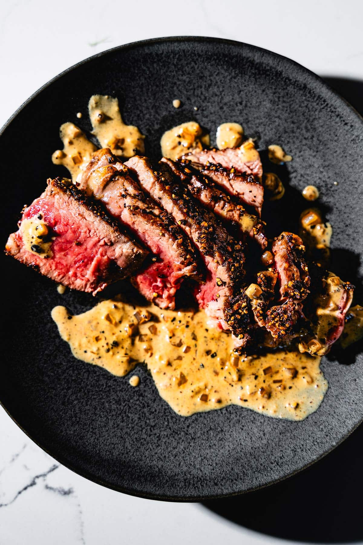 steak au poivre overhead on plate
