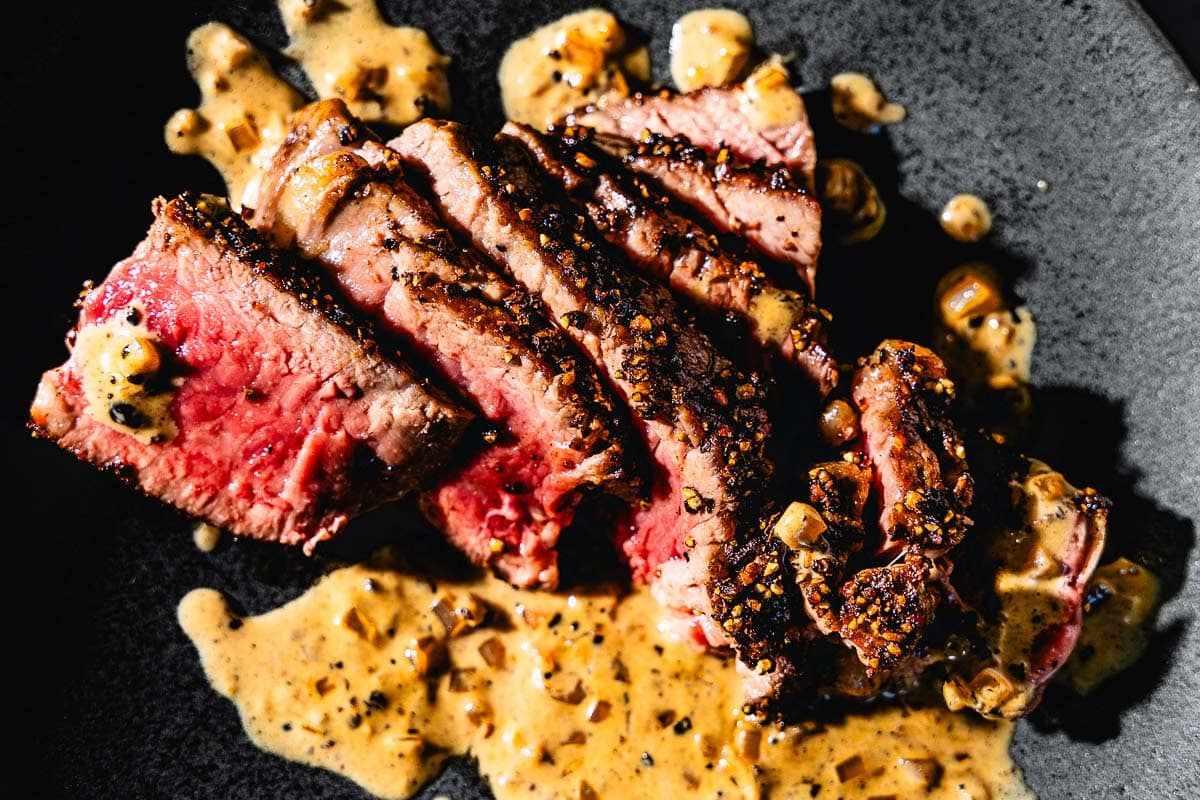 steak au poivre sliced close up