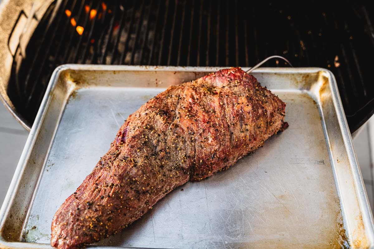 tri tip in front of grill horizontal