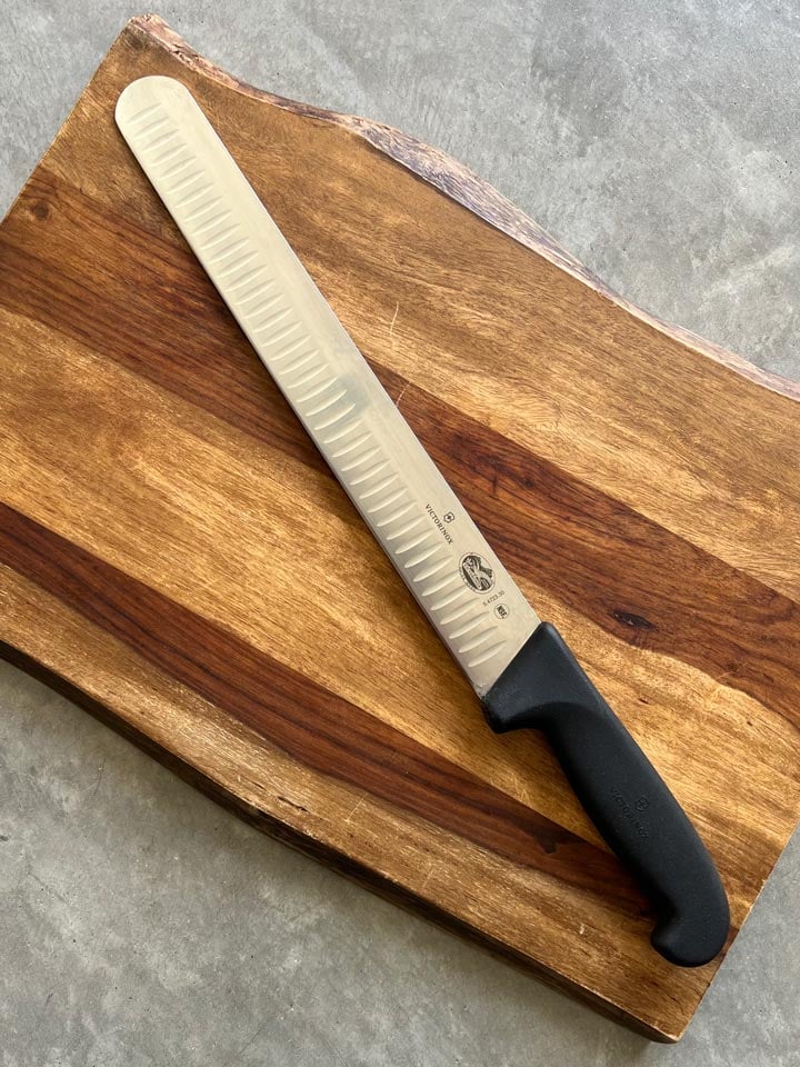 victorinox fibrox pro slicing knife on cutting board